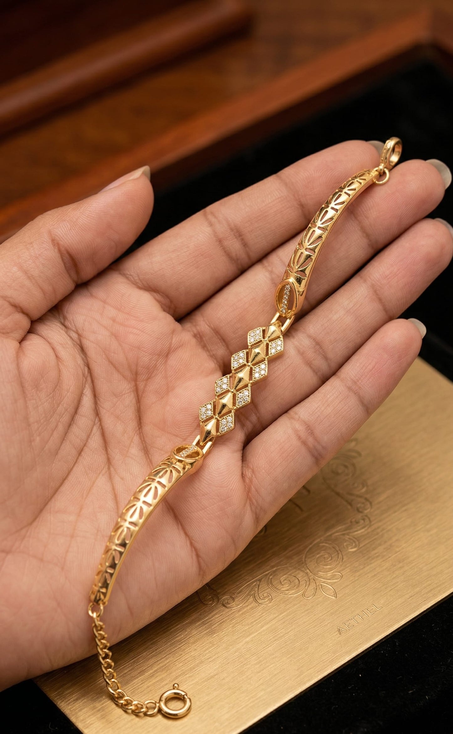 Elegant Gold-Plated Floral Link Bracelet with AD Stone triangle shape adjustable bracelet