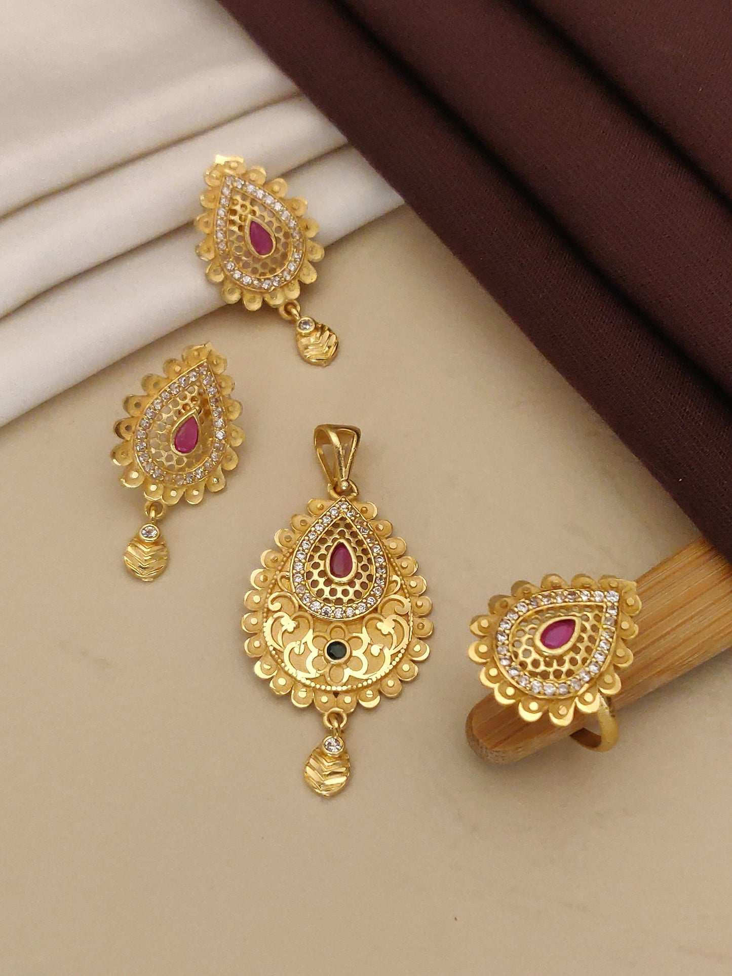 Designer High Gold Plated And Diamond Studded Facny Forming Pendent Set with Earring And Ring
