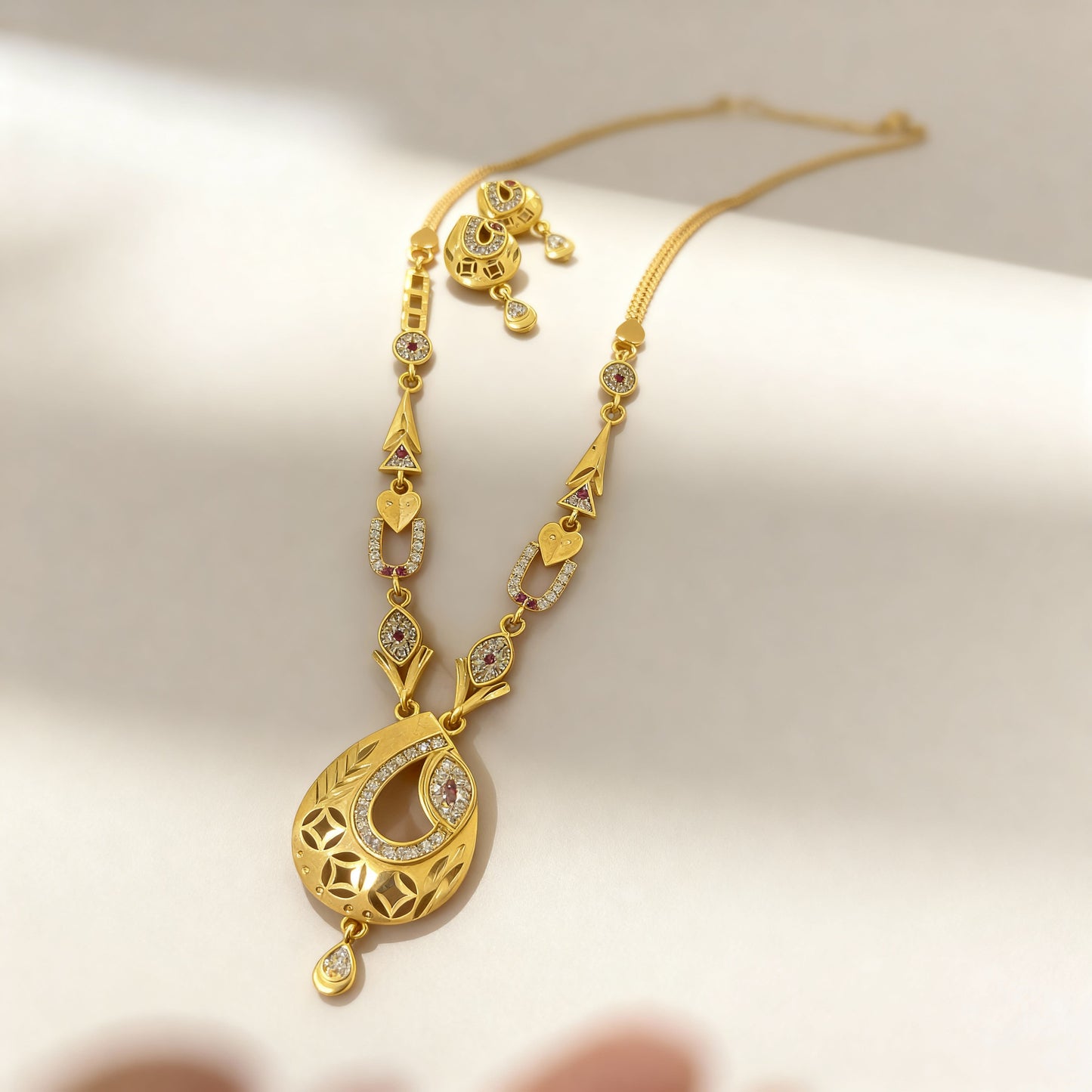Micro Gold Plated And Diamond Studded Fancy Oval Pendant Set with Earring