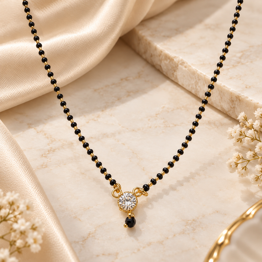 Elegant Gold-Plated Single-Stone Diamond Mangalsutra with Traditional Black Beads