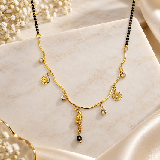 Elegant Gold-Plated Floral Charm Mangalsutra with Crystal Accents & Black Beads