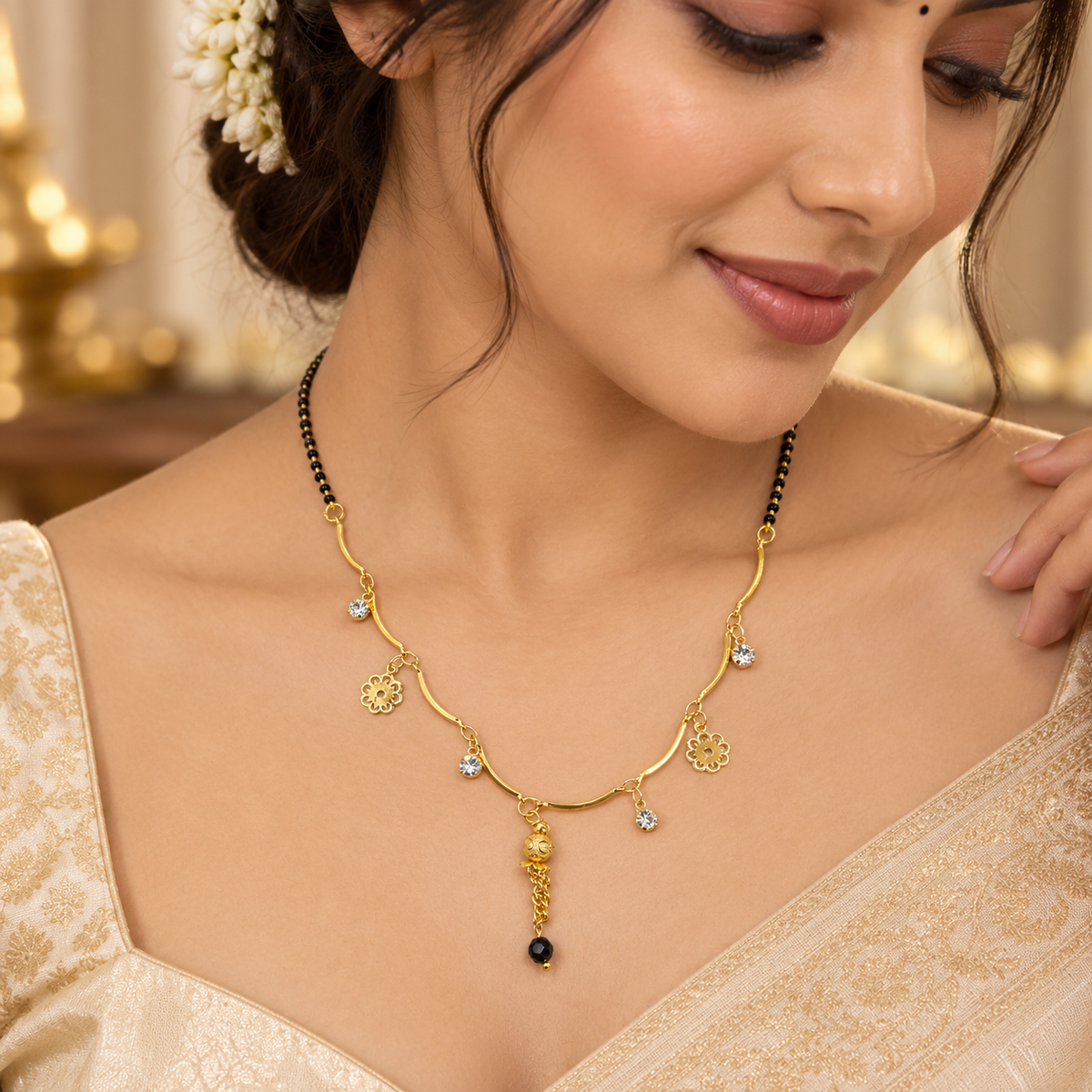 Elegant Gold-Plated Floral Charm Mangalsutra with Crystal Accents & Black Beads