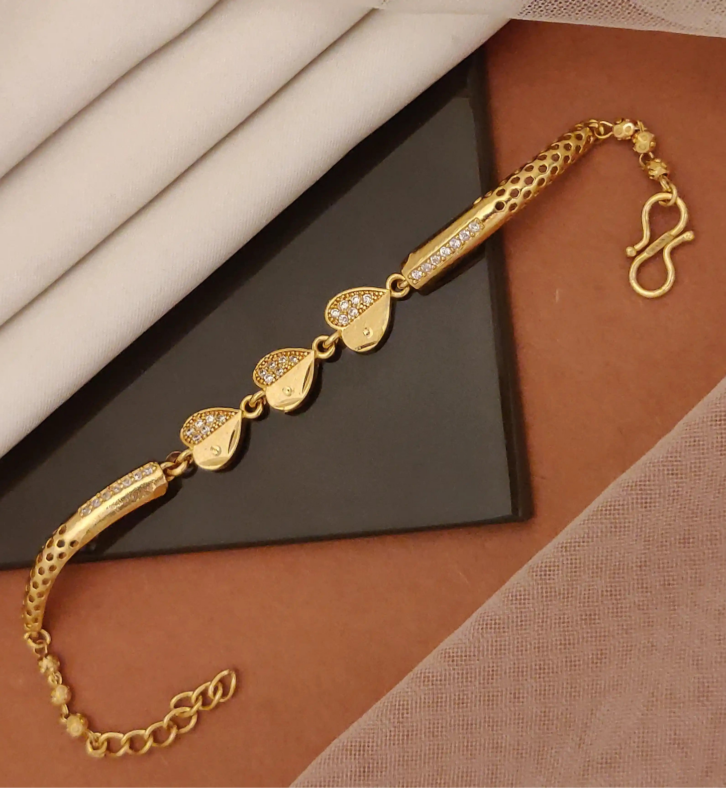 Gold Tone Plated And Diamond Studded Fancy Heart Charm Bracelet