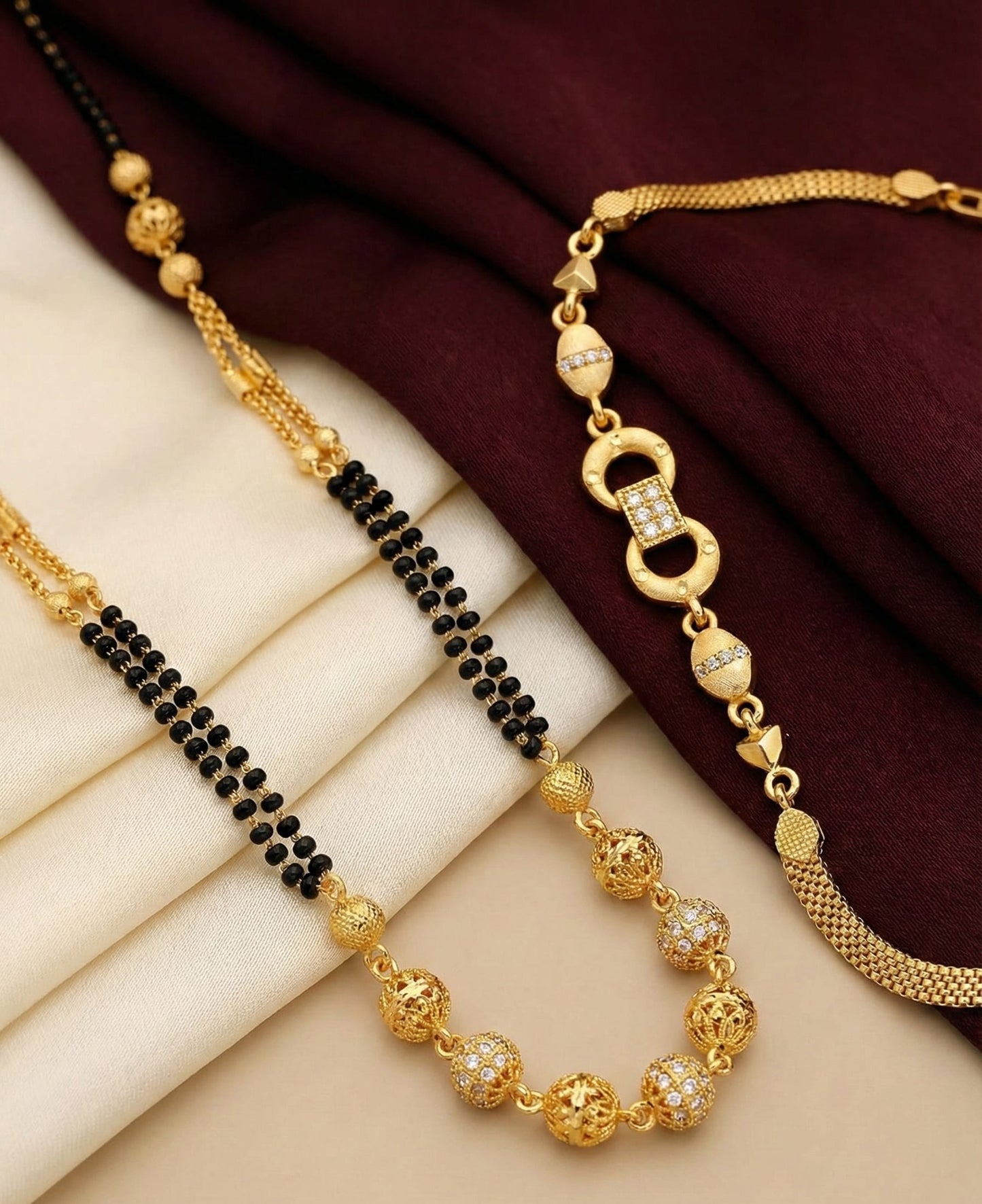 Elegant Dual Line Black Beaded Gold-Plated Mangalsutra with Designer Gold  Plated Bracelet