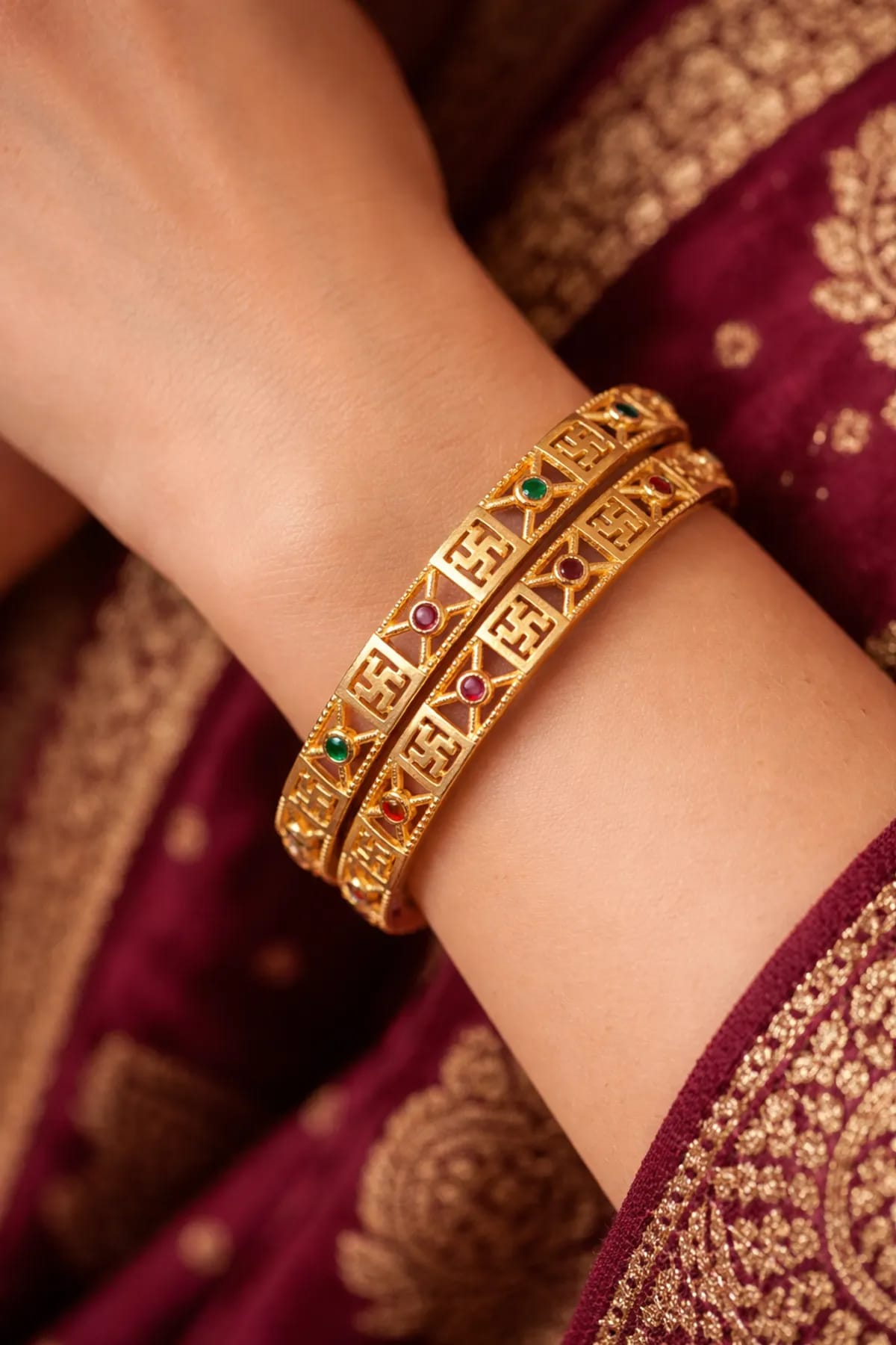 Heritage Swastik Gold plated 2 pcs bangle with Multicolor Stones.