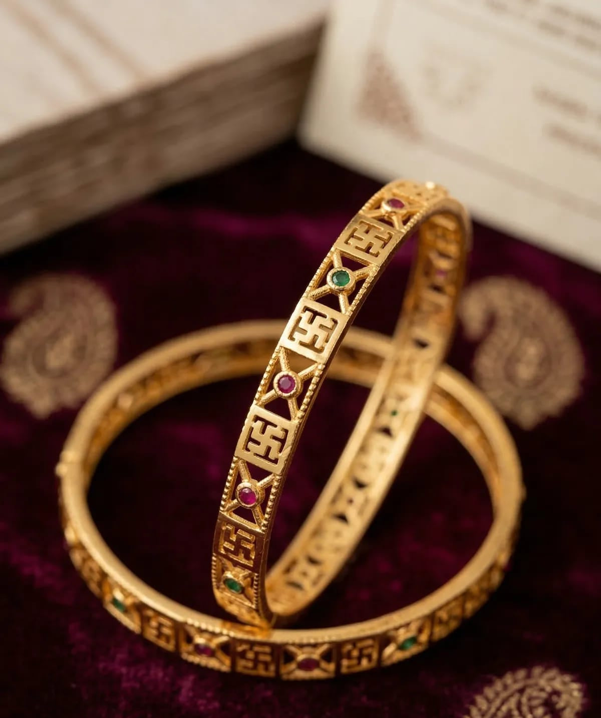 Heritage Swastik Gold plated 2 pcs bangle with Multicolor Stones.