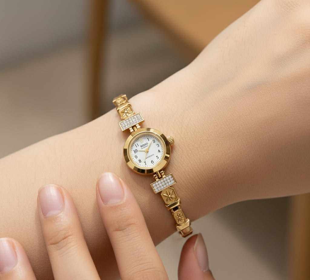 Sophisticated Gold Plated Crystal Studded Jewelry Watch For A Royal Look