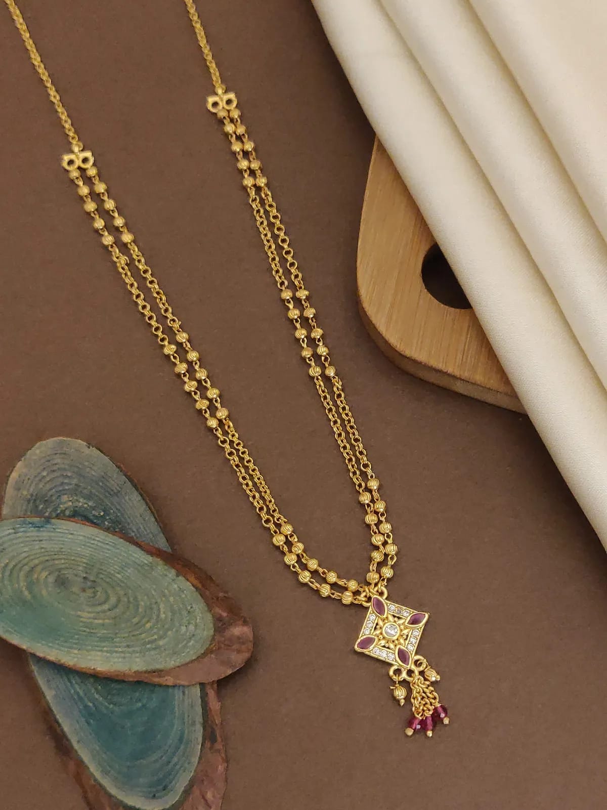 A Stunning High Gold Plated And Diamond Ruby Stone Fancy Square Chain